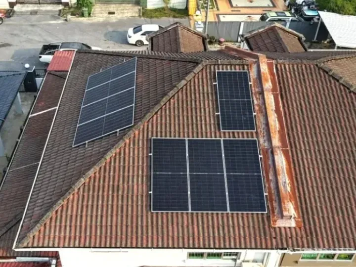 Aerial view of an 8 panel solar system on a tiled roof at Lorong Greenwood, Kuching